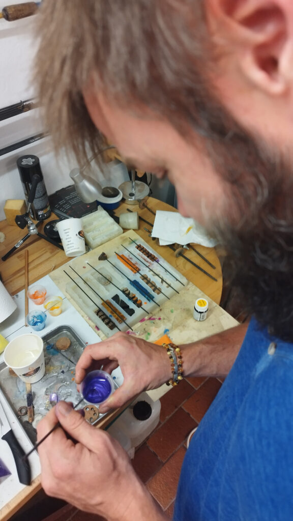 Michael Fouracres working on fishing rod components